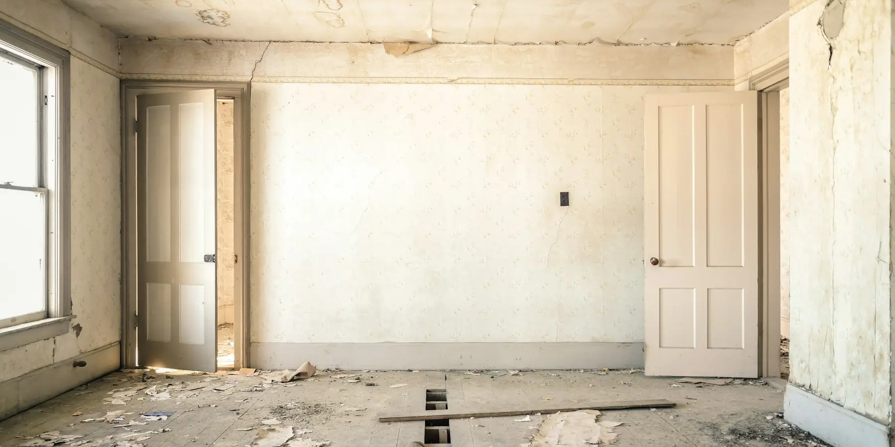 Empty interior room stripped and ready for remodeling work